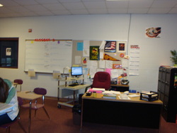 Back of my Classroom; Algebra 2A and 2B board and my desk